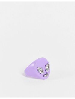 plastic ring with alien face in lilac