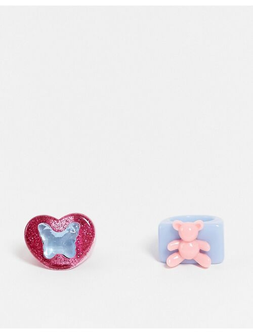 ASOS DESIGN pack of 2 glitter plastic rings with plastic bear and butterflies