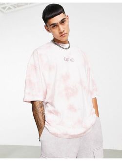 ASOS DARK FUTURE oversized t-shirt in washed pink with chest logo