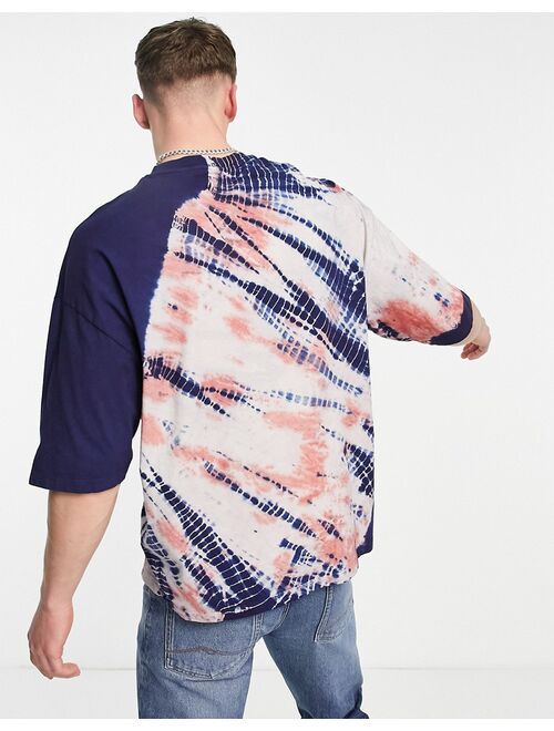 ASOS DESIGN oversized t-shirt in all over orange and blue tie dye