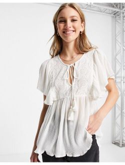 eyelet top with pleated flutter sleeve in cream