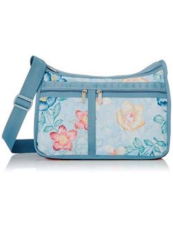 Floral Daydream Deluxe Everyday Crossbody Bag   Cosmetic Bag, Style 7507/Color F901, Pastel Blue Bag Features Full Size Multicolor Blooms in Navy, Light Blue,