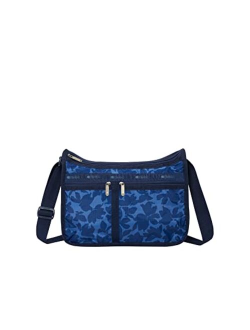 LeSportsac Flower Petals Deluxe Everyday Crossbody Bag + Cosmetic Bag, Style 7507/Color F976, Navy Blue Flower Petals Artfully Arranged in Modern Abstract Style Design, S