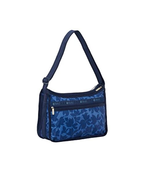 LeSportsac Flower Petals Deluxe Everyday Crossbody Bag + Cosmetic Bag, Style 7507/Color F976, Navy Blue Flower Petals Artfully Arranged in Modern Abstract Style Design, S