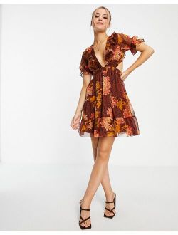 mini dress in floral and animal mix print with lace up back detail