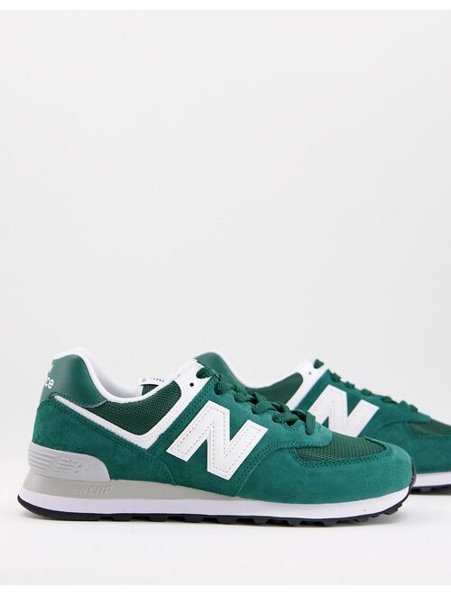 New Balance 574 sneakers in deep green and white