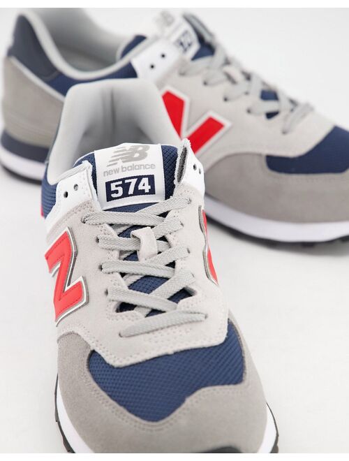 New Balance 574 sneakers in off-white and navy