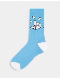 Snoopy on a cloud sports socks