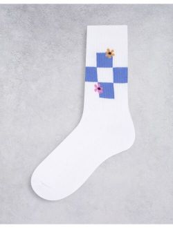 sports socks with checkerboard floral in white