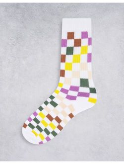 multicolored checkerboard sports sock in white
