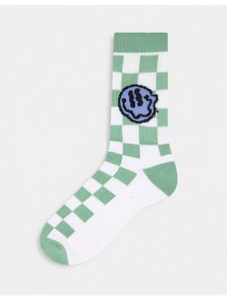 checkerboard sports socks with wavy smiley face