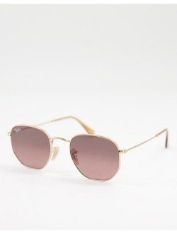 hexagonal sunglasses in gold with brown lens