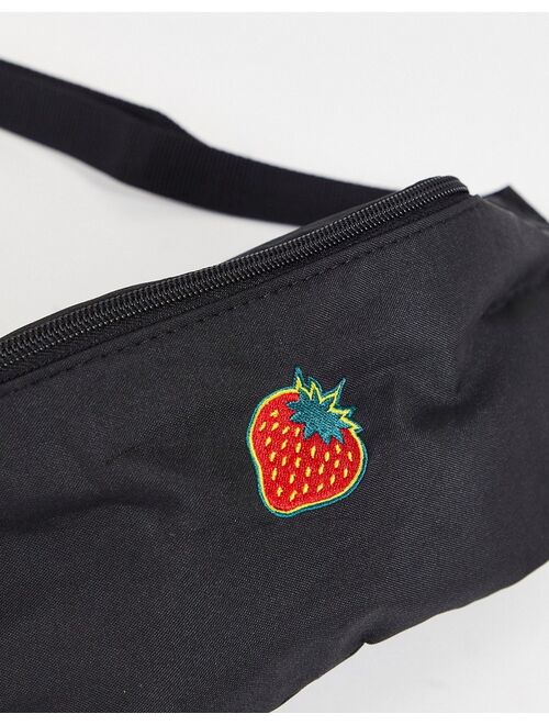 ASOS DESIGN fanny pack with strawberry embroidery