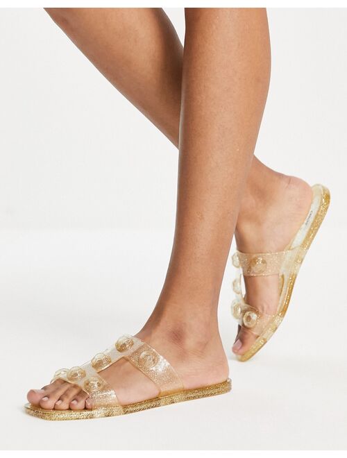 ASOS DESIGN Fuel studded jelly mule sandals in glitter