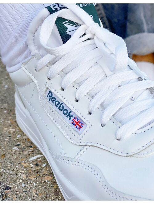 Reebok Court Peak sneakers in white and green
