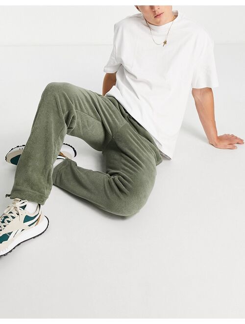 Reebok towelling sweatpants in olive green - exclusive to ASOS