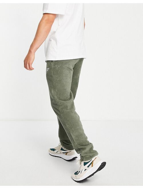 Reebok towelling sweatpants in olive green - exclusive to ASOS