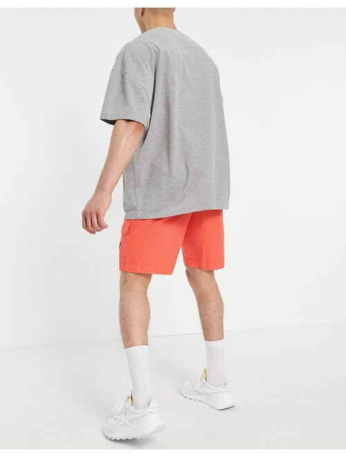 Reebok Classics woven cargo shorts in orange