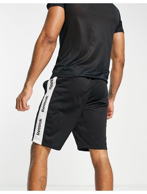 Reebok training essentials linear logo shorts in black