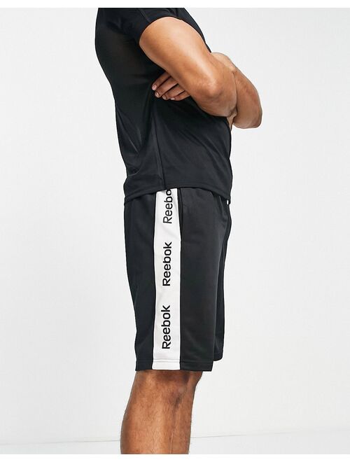 Reebok training essentials linear logo shorts in black
