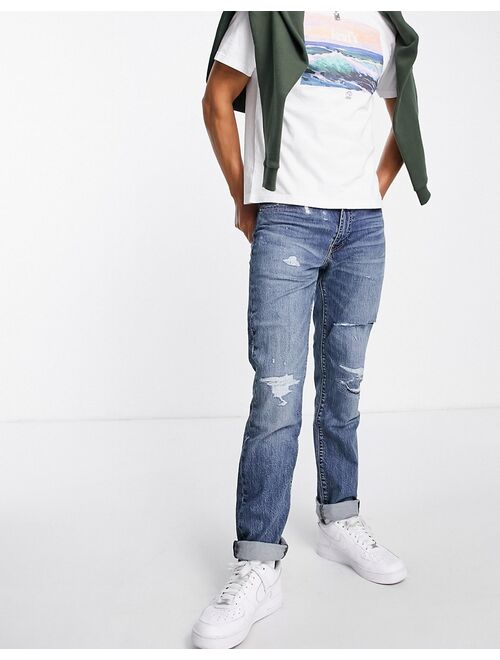 Levi's 511 slim jeans in blue wash with abraisons