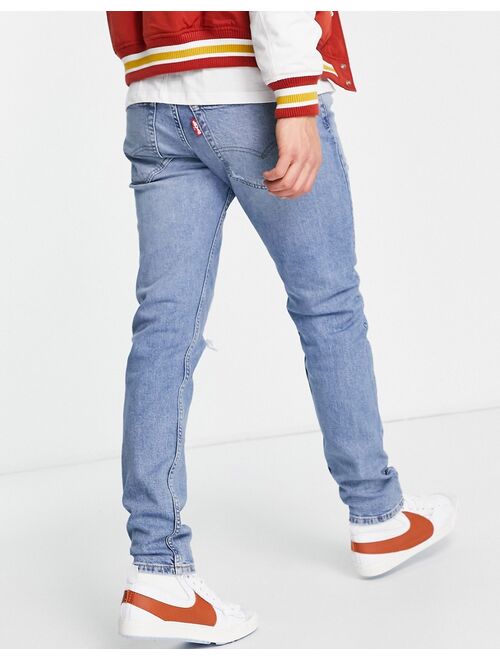 Levi's 512 slim taper lo ball jeans in light blue wash with rips