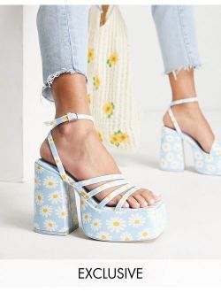 Exclusive platform heeled sandals in blue daisy print