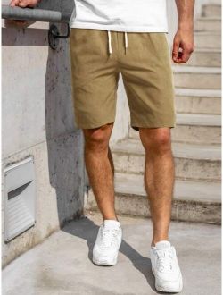 Men Solid Drawstring E-Waist Regular Fit Shorts