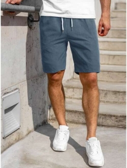 Men Solid Drawstring E-Waist Regular Fit Shorts