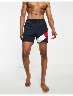 flag leg logo mid length swim shorts in navy