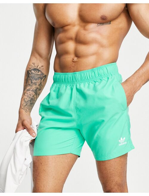 adidas Originals Essentials swim shorts in hi-res green