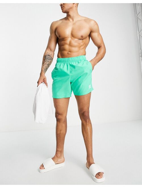 adidas Originals Essentials swim shorts in hi-res green