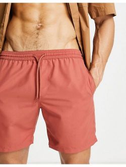 swim shorts in rust red mid length