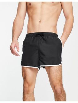 runner swim shorts in black with contrast white piping
