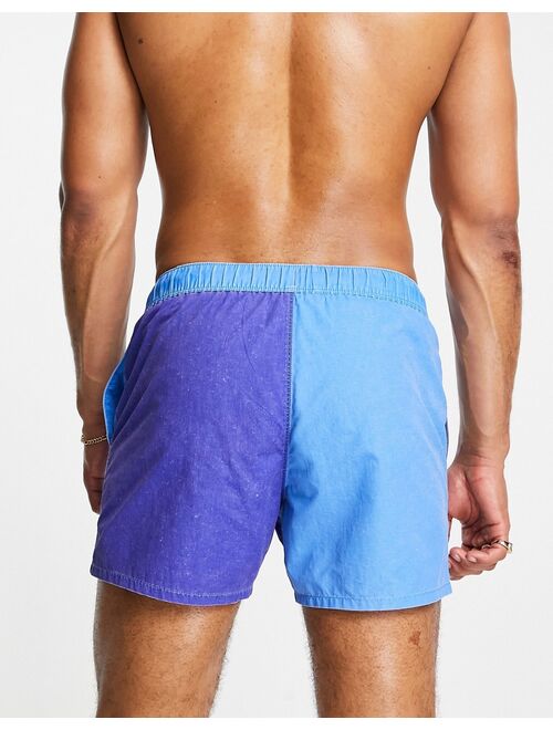 ASOS DESIGN swim shorts in blue color block acid wash short length