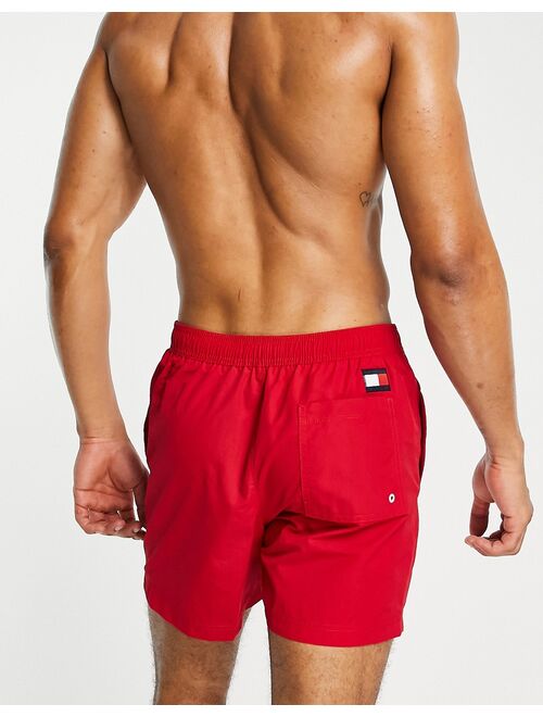 Tommy Hilfiger flag leg logo mid length swim shorts in red