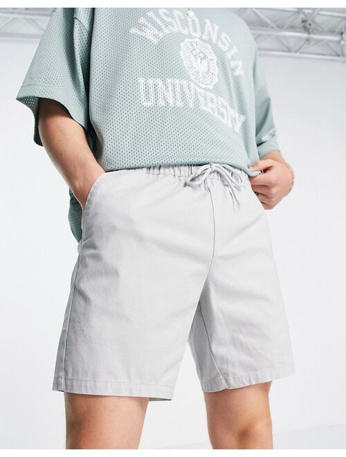 ASOS DESIGN slim chino shorts with elastic waist in light gray