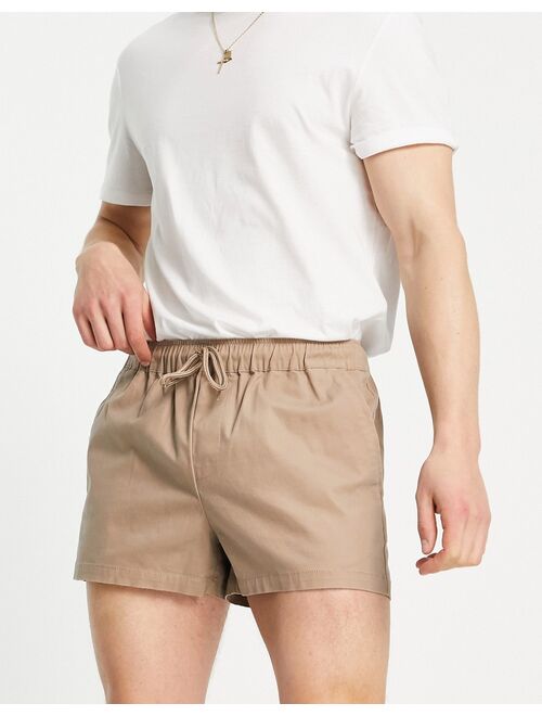 ASOS DESIGN slim chino shorter shorts with elasticated waist in beige