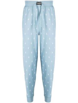 all-over logo print trousers