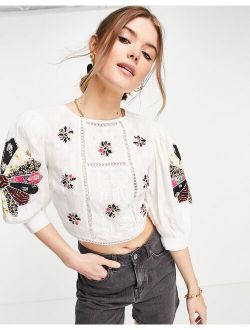 patchwork sleeve and front crop top with lace up back in white