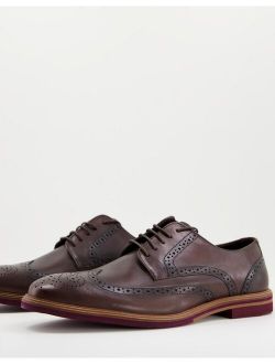 leather brogue in brown with contrast sole