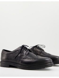 brogue shoes in black leather with chunky sole
