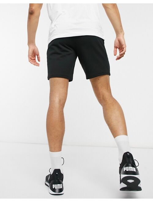 Puma logo jersey shorts in black