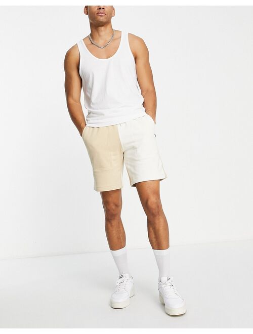 Puma Downtown color block logo shorts in beige