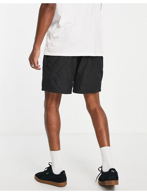 Puma logo quilted shorts in black exclusive to ASOS