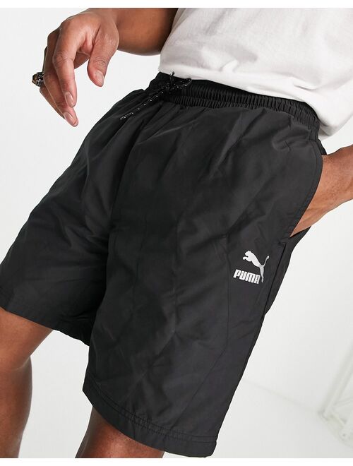 Puma logo quilted shorts in black exclusive to ASOS