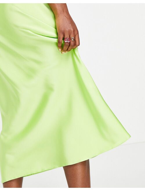 ASOS DESIGN Hourglass satin bias midi slip skirt in lime green