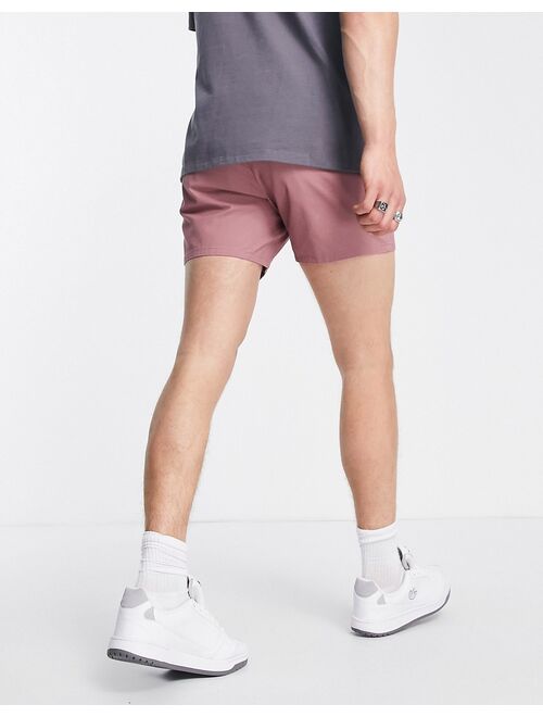 ASOS DESIGN slim chino shorts with elastic waist in pink