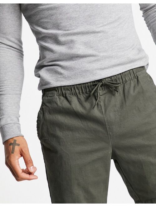 ASOS DESIGN slim chino shorts with elastic waist in khaki