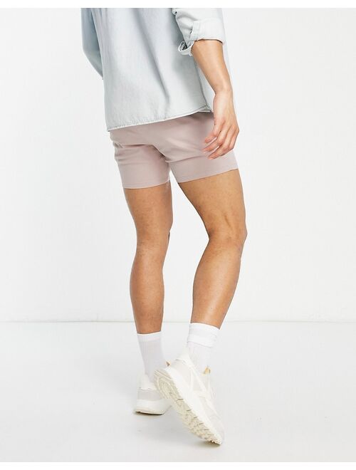 ASOS DESIGN skinny chino shorts with pin tuck and elasticated waist in pink
